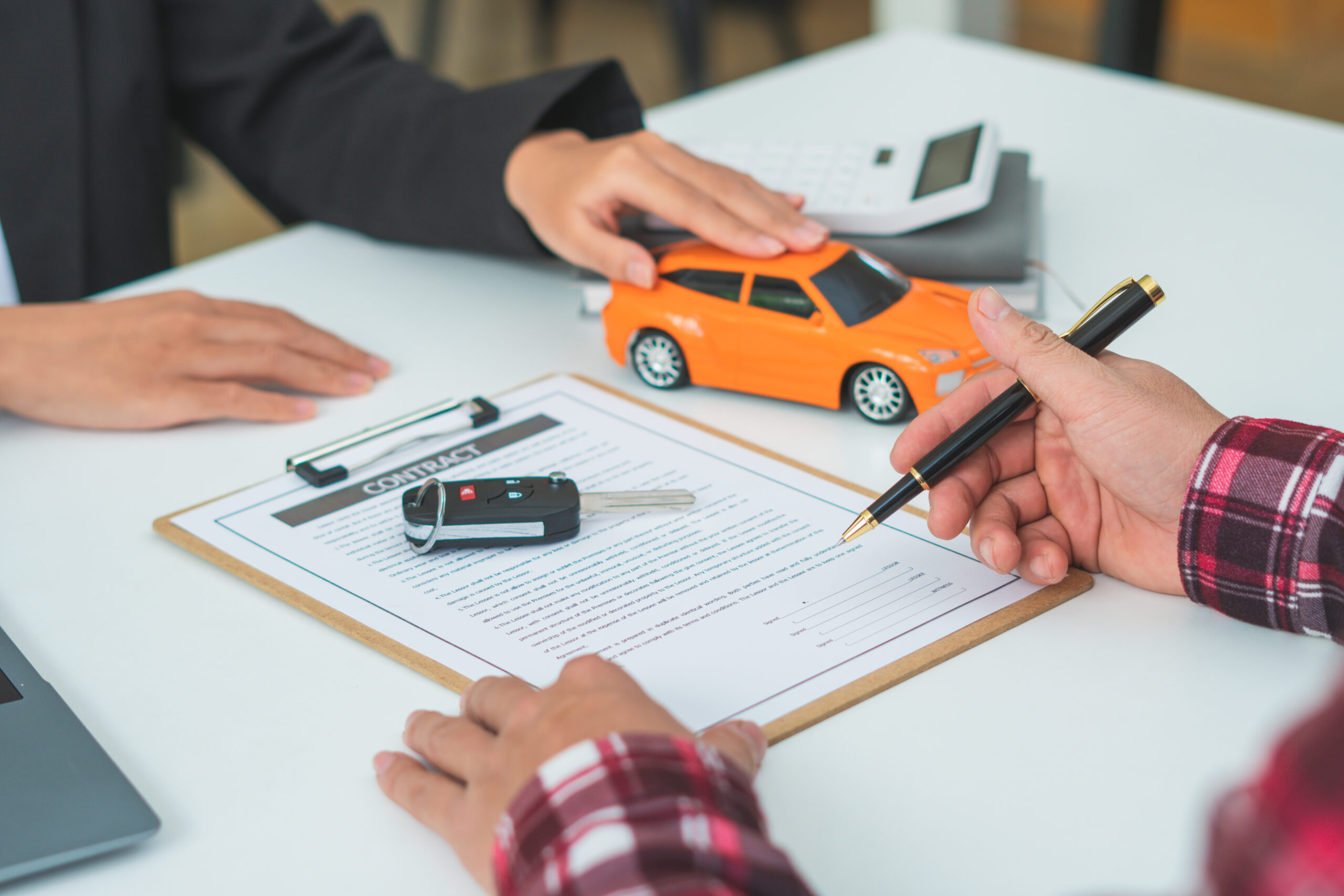 man signing car insurance document or lease paper 2023 11 27 05 26 34 utc scaled